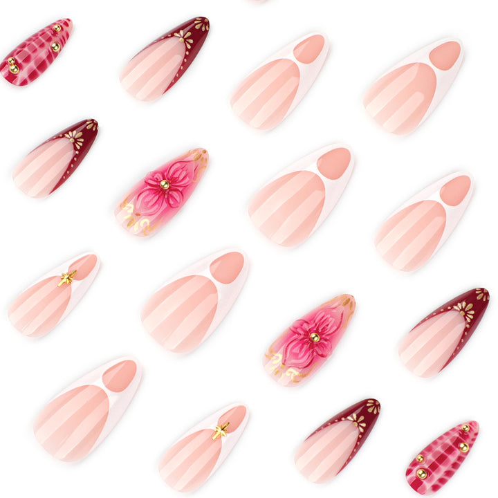 Artistic Nail Art with Floral and Glitter Accents Kalsten