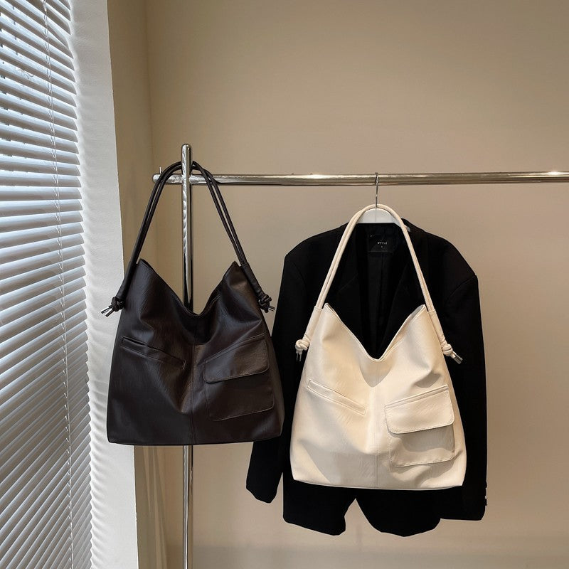 Casual tote bag with practical front pockets Kalsten