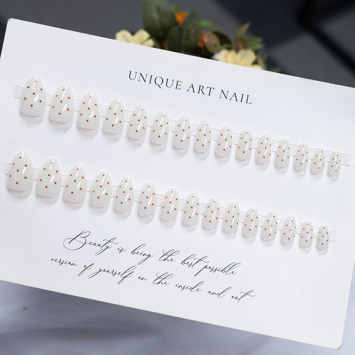 Artistic Press-On Nail Set with Unique Spot Design