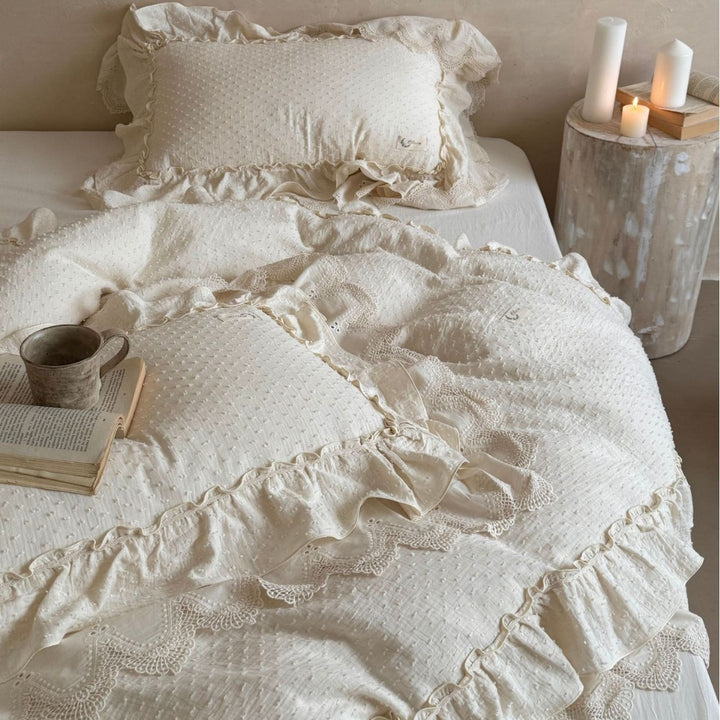 Bedding set in Shabby Chic with textured polka dot look, multi-layered ruffle, and lace finish
