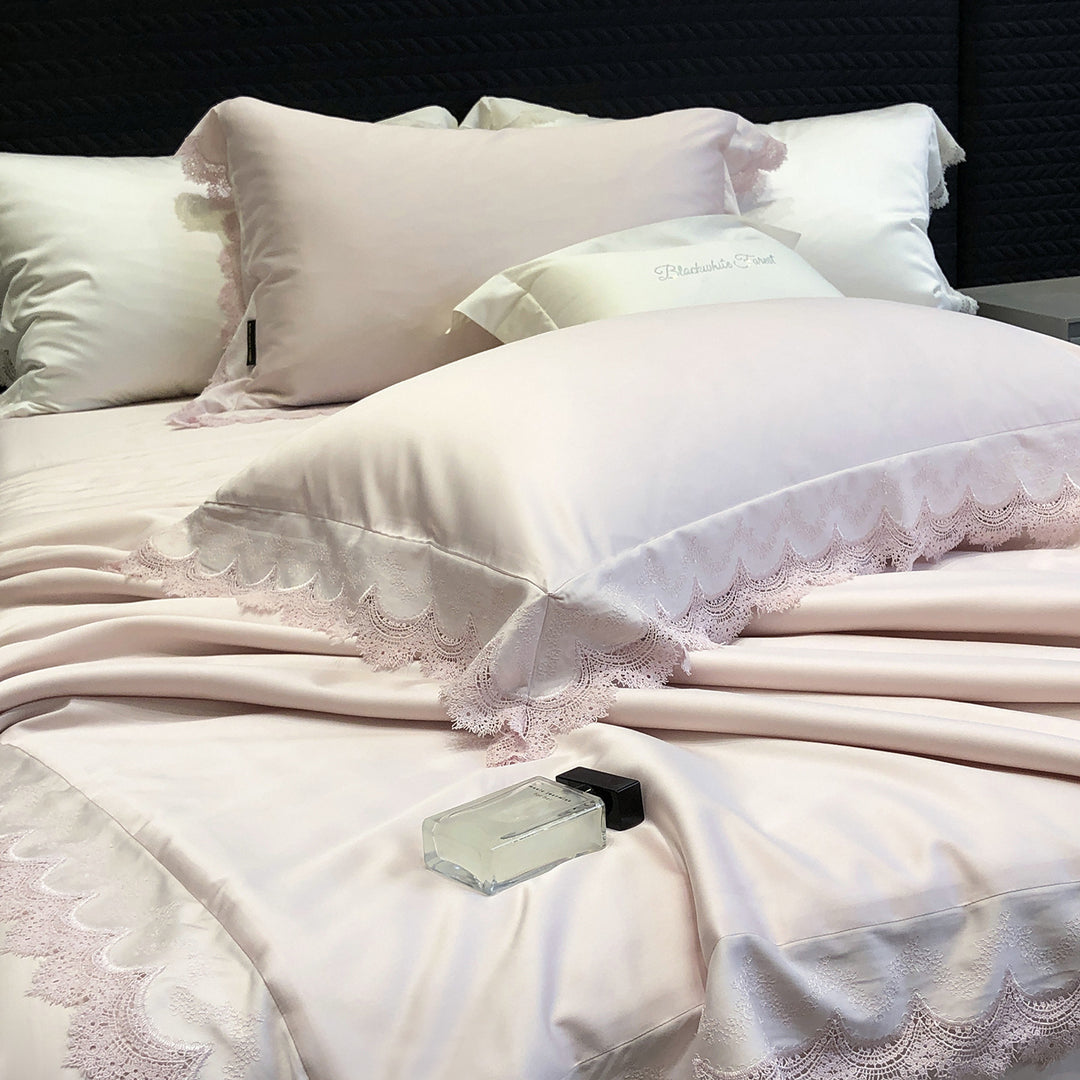 Elegant satin bedding set with lace trim and quilted bedspread