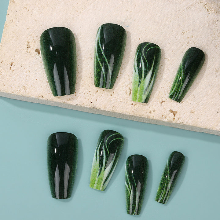Creative nail art with green design Kalsten