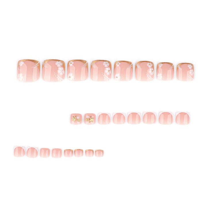Artful toenail art with delicate flower and glitter accents Kalsten