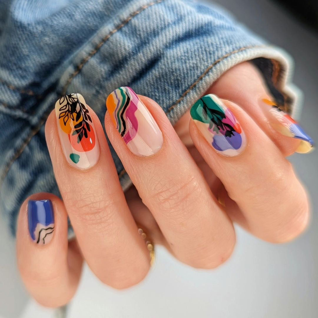 Artistic nail design with colorful accents Kalsten