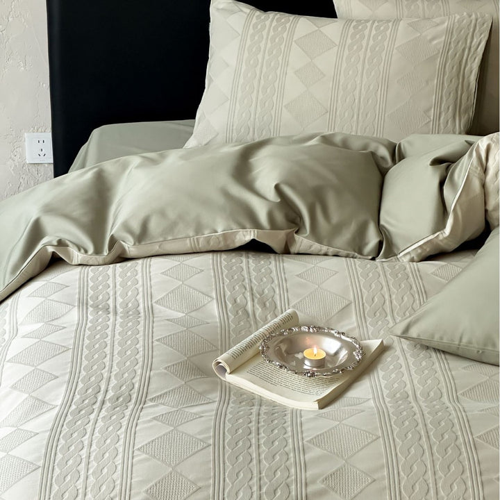 Structured bedding set with embossed cable pattern