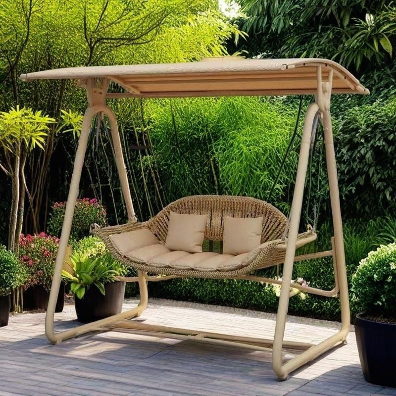 Woven rattan outdoor swing loveseat with padded cushions and powder-coated steel frame Kalsten