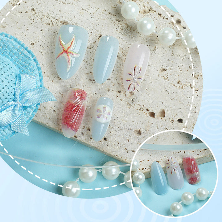 Artificial nails with maritime shell motifs Kalsten