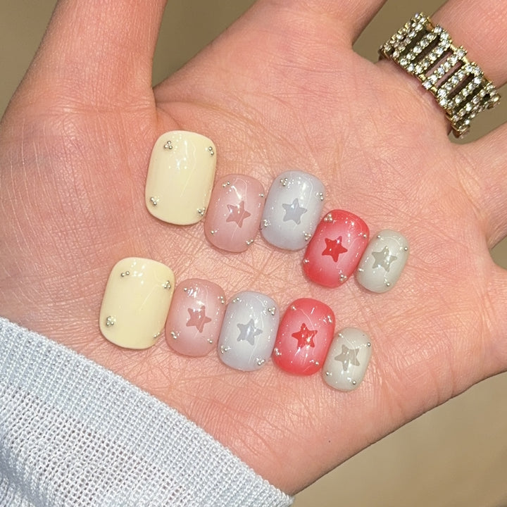 Artificial nails with sparkling star motifs Kalsten