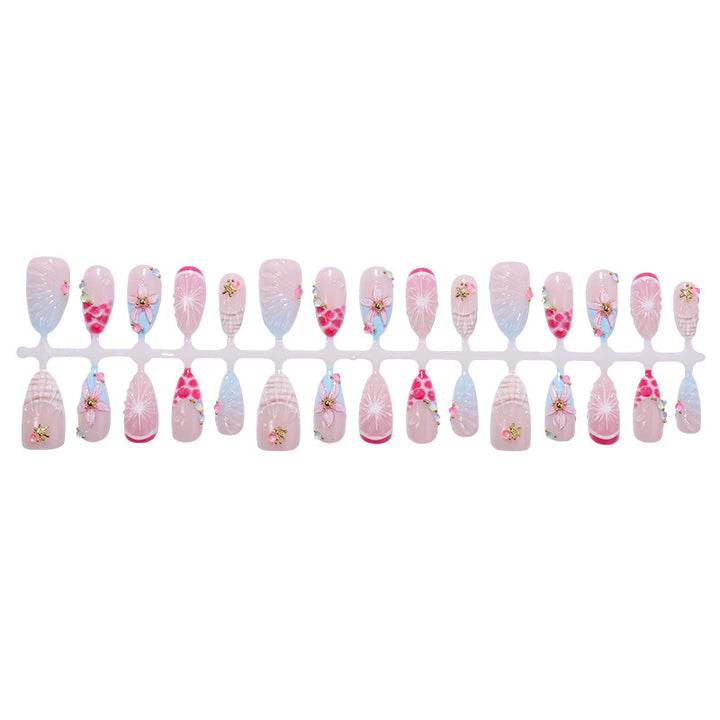 Creative nail art set with floral designs and decorative accents Kalsten