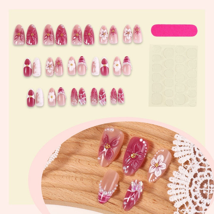 Artificial nail set with floral design and glitter accents Kalsten