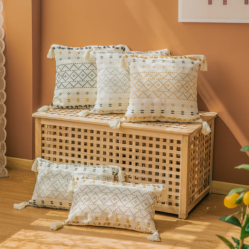 Square decorative cushion cover made of cotton blend with hand-tufted geometric relief and tassels