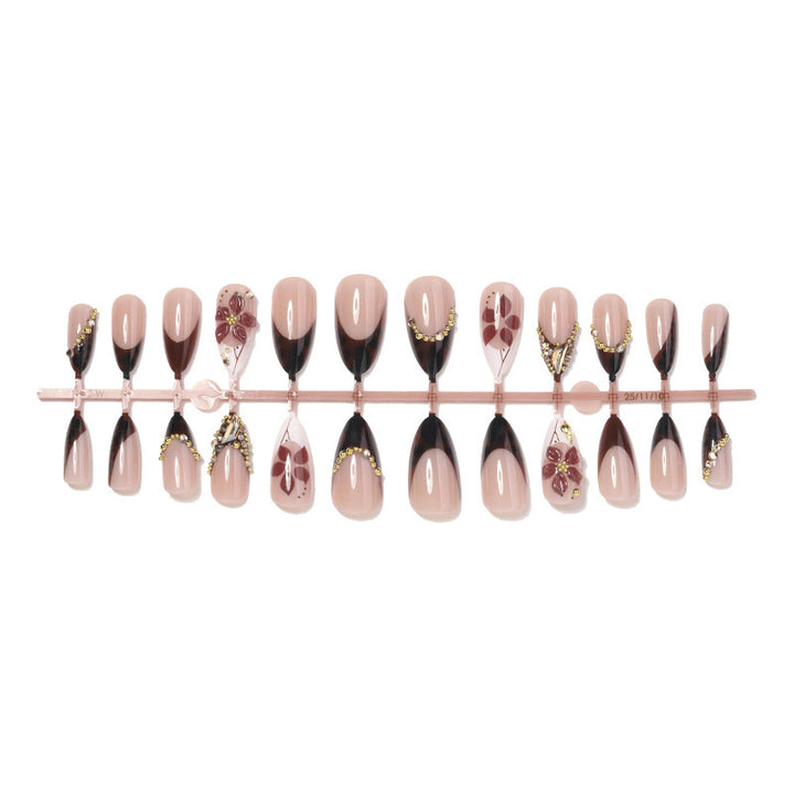 Acrylic nail set with elegant flower and glitter accent Kalsten