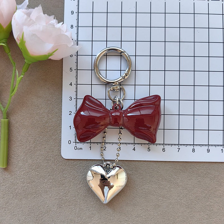 Keychain with bow and heart motif Kalsten