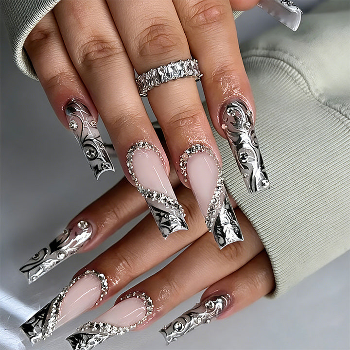 Acrylic nail set with elegant patterns and sparkling accents Kalsten