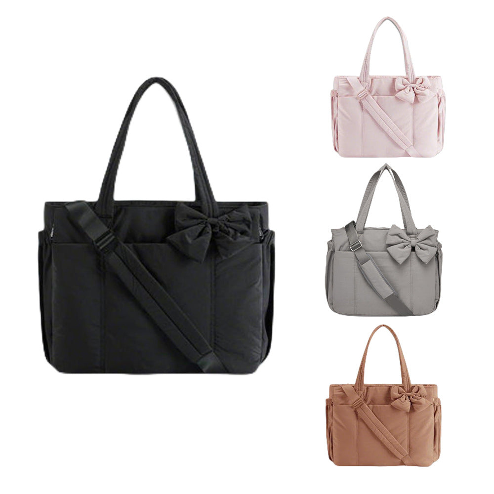 Multifunctional tote bag with detachable shoulder straps and decorative bow Kalsten