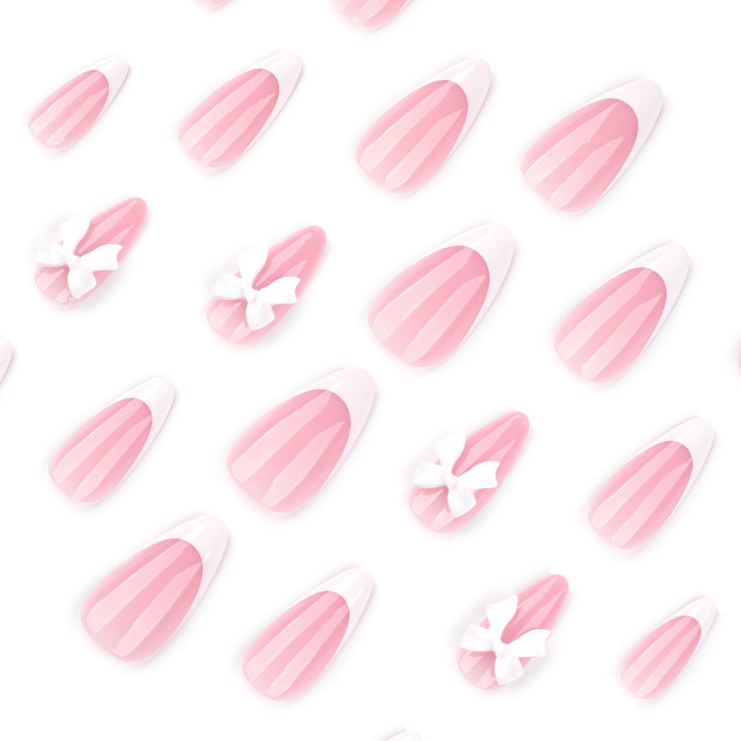 Artful nail designs with elegant tips and delicate bow motifs Kalsten
