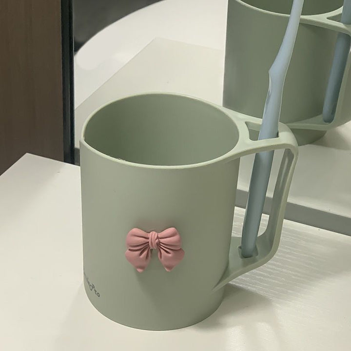 Ceramic mug with elegant bow motif Kalsten