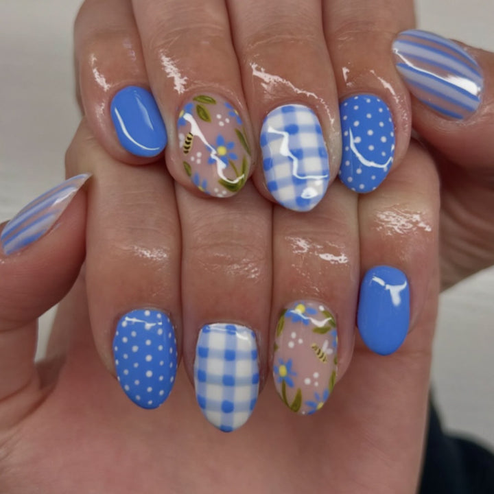 Artful Nail Art with Floral and Geometric Designs Kalsten
