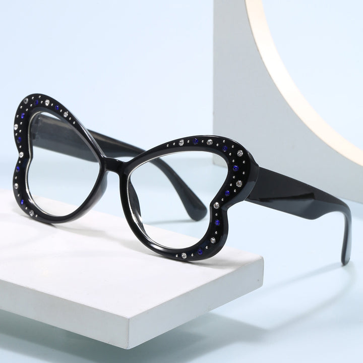 Women's playful heart-shaped sunglasses with glitter accents Kalsten