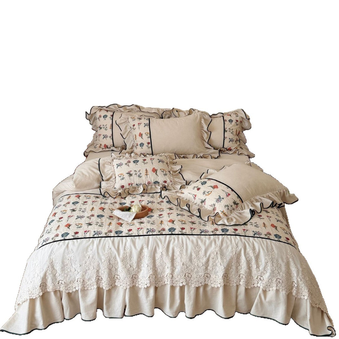 luxurious quilted bedspread set with embroidered lace and flounces