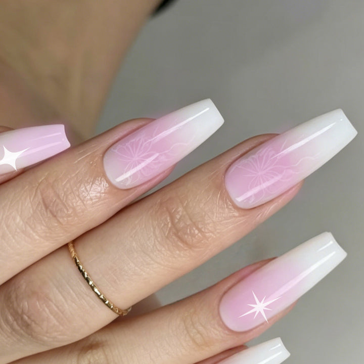 Artificial nails with delicate ombre effect and floral accents Kalsten