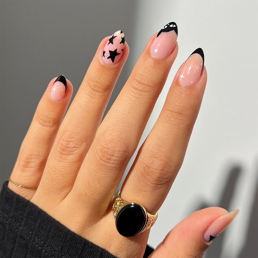 Artificial nail art with playful dots and bows Kalsten