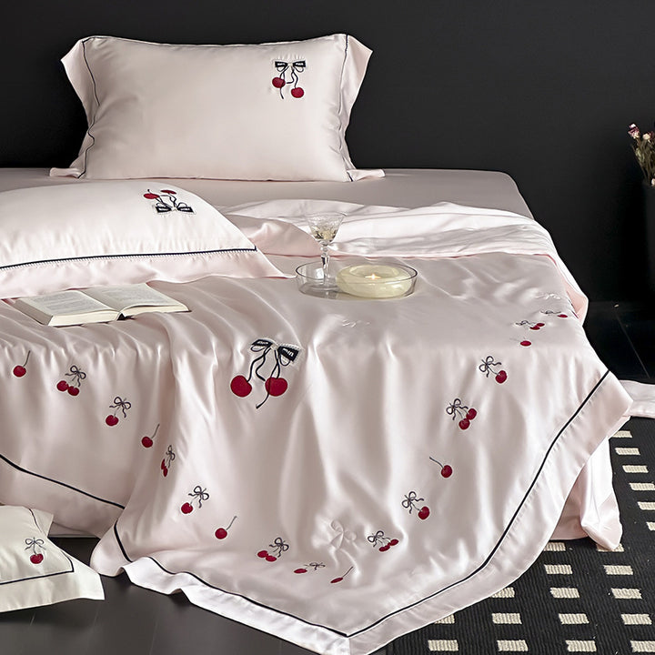 Cotton satin bedding set with cherry embroidery and contrasting piping