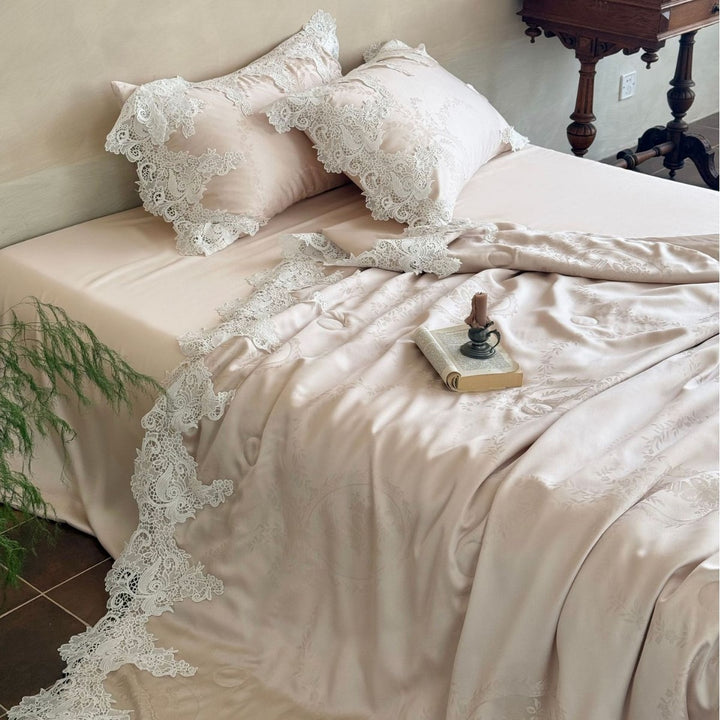 Luxurious satin bedding set with floral jacquard texture and lace trim