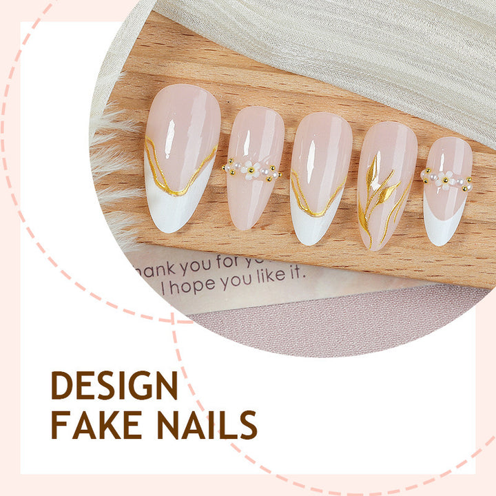 Artificial nail set with elegant gold accents and floral designs Kalsten
