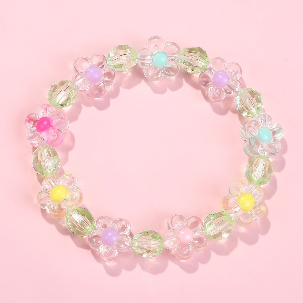 Friendship bracelet with colorful flower motifs Kalsten