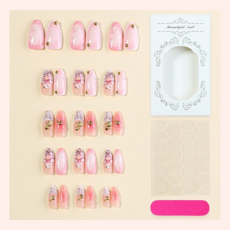 Acrylic nail set with elegant floral design and sparkling accents Kalsten