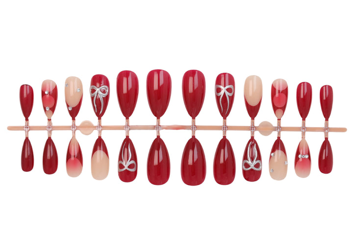 Artificial nail set with luxurious glitter and gemstone embellishments Kalsten