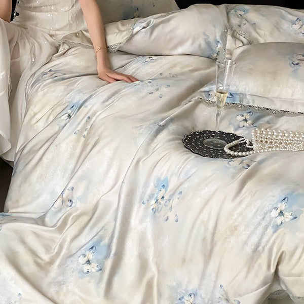 Premium bedding made of fine satin with watercolored floral design and lace edge