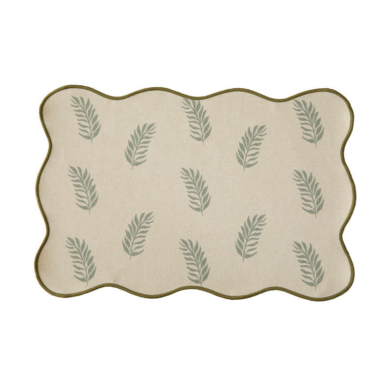 Shaped table set with curved contour and botanical leaf pattern Kalsten
