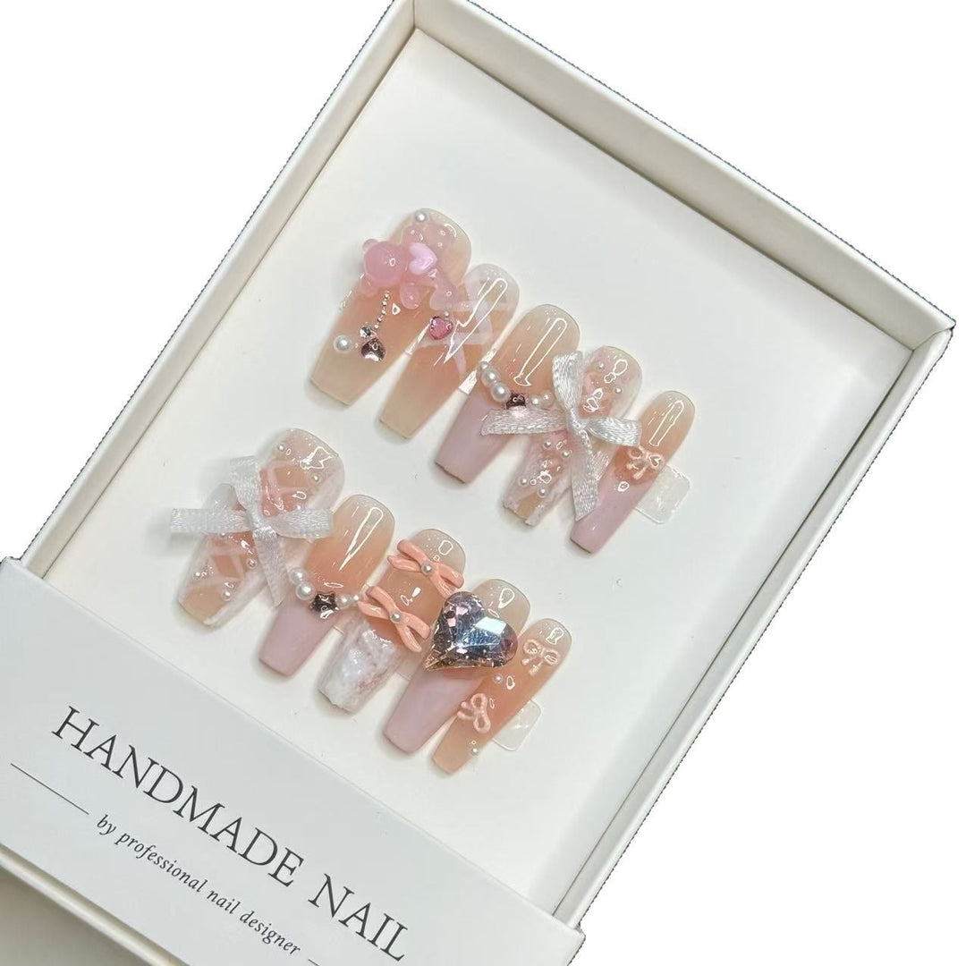 Artistic Press-On Nail Set with Decorative Bow and Gem Accents