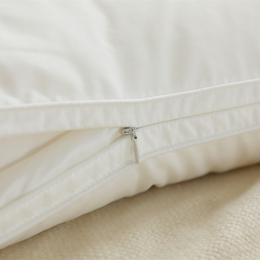 Pillow set with removable topper and washable zip cover