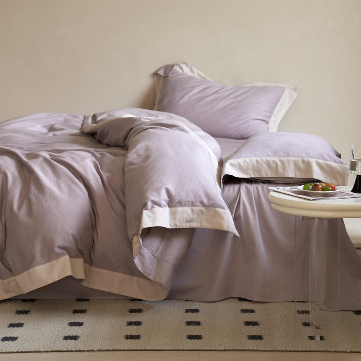 High-quality bedding set made of cotton satin with jacquard floral relief and contrasting hem finishing