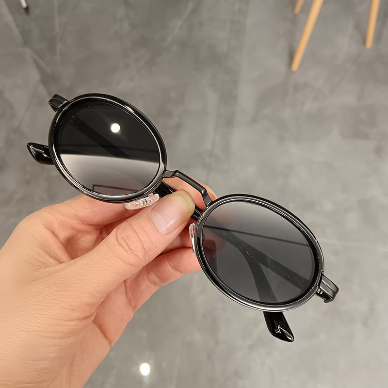 Women's round sunglasses with lightweight lenses and gold accents Kalsten