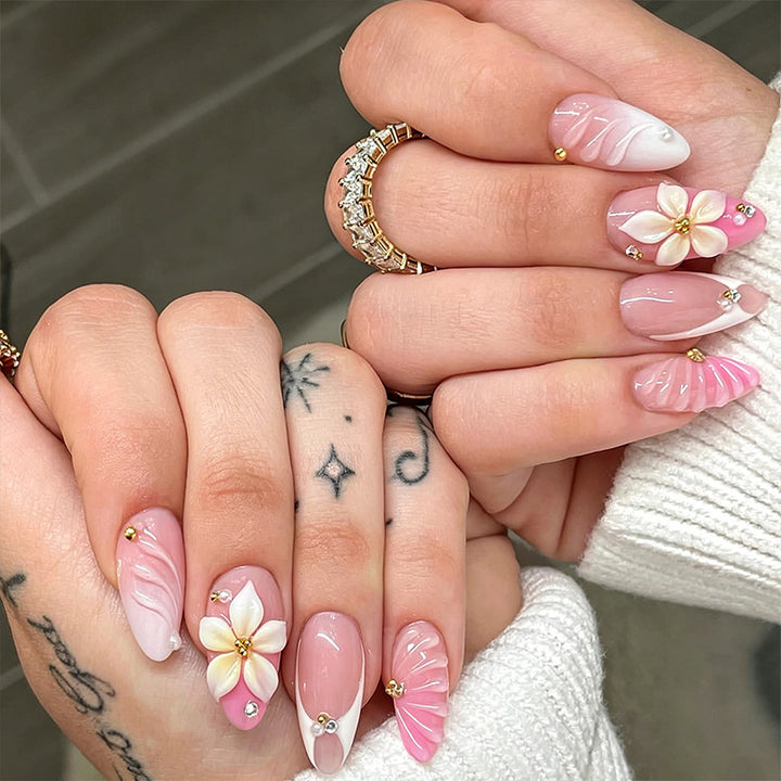 Nail art set with filigree flower patterns and sparkling accents Kalsten