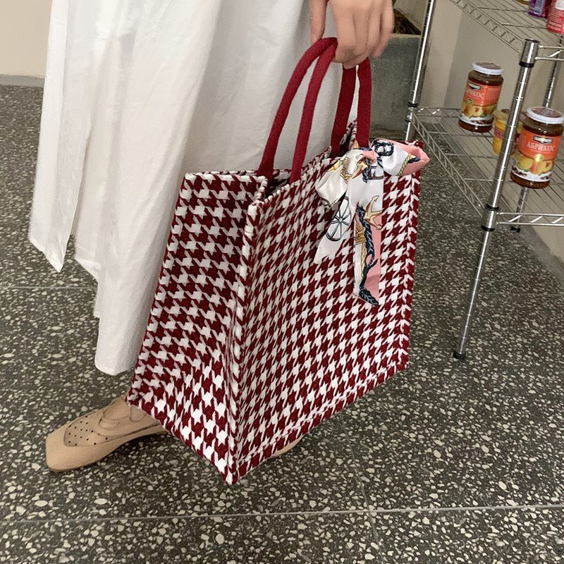 Elegant Houndstooth Handbag with Decorative Bow