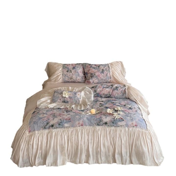 Romantic bed linen set made of cotton satin with ruffled frill and floral jacquard