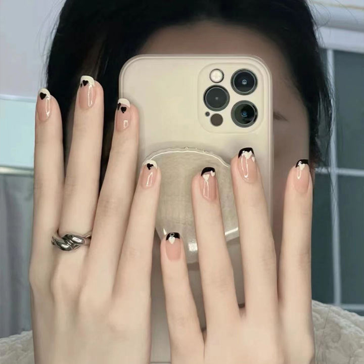 Artistic Press-On Nail Set with Heart and Leaf Designs
