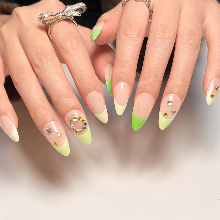 Artificial nail art with spring-like design and sparkling accents Kalsten