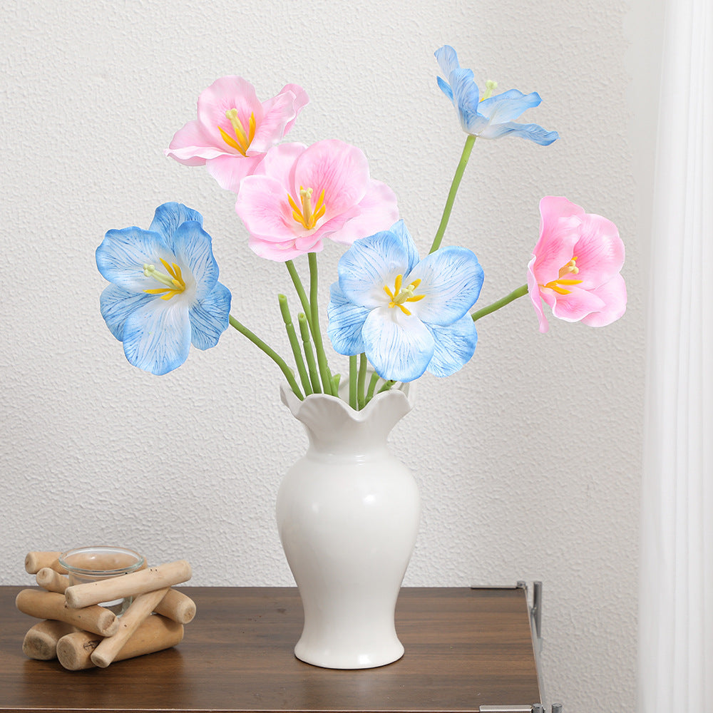 Artificial orchid flower branch with intricately detailed flowers