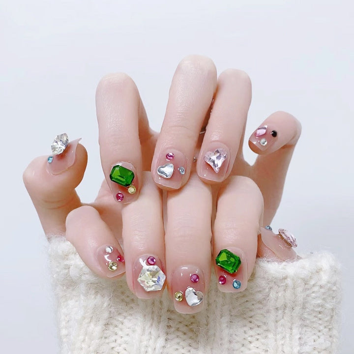 Acrylic nail set with sparkling 3D applications and beautiful heart designs Kalsten