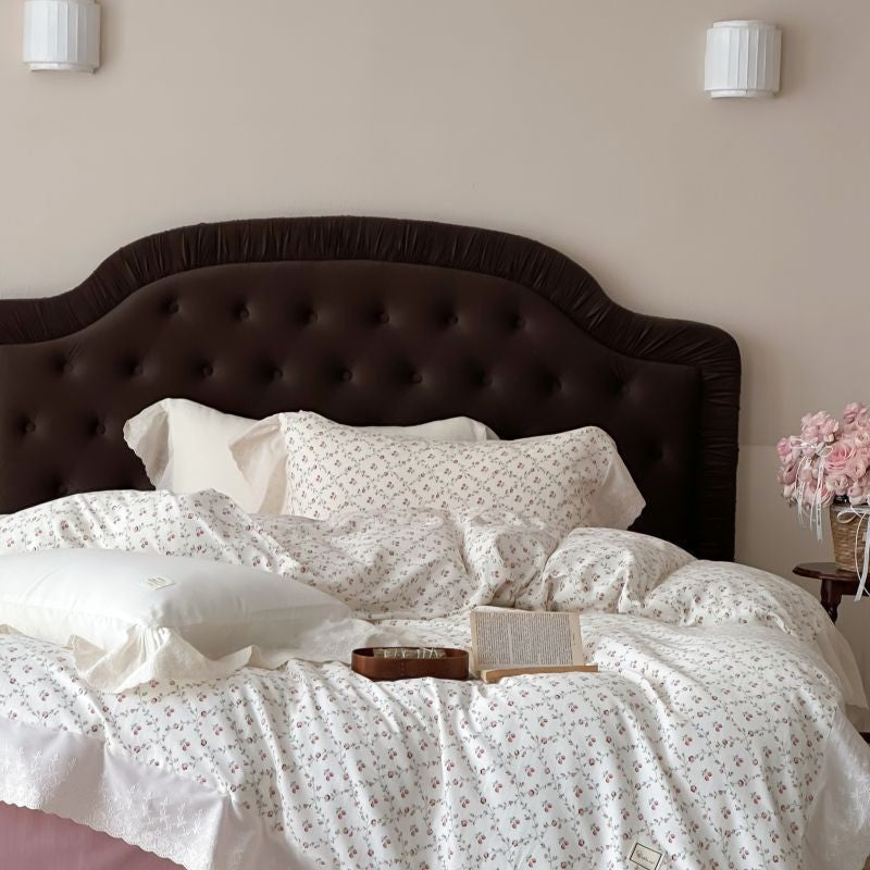 Luxurious cotton satin bed linen set in vintage style with delicate floral pattern and lace trim