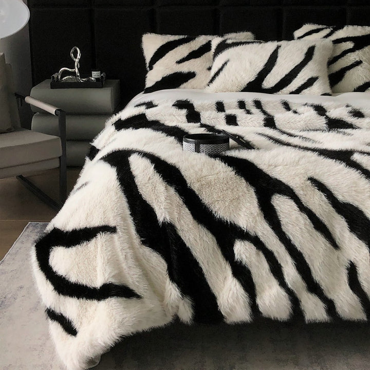 Faux fur bedspread with zebra design and extra fluffy texture