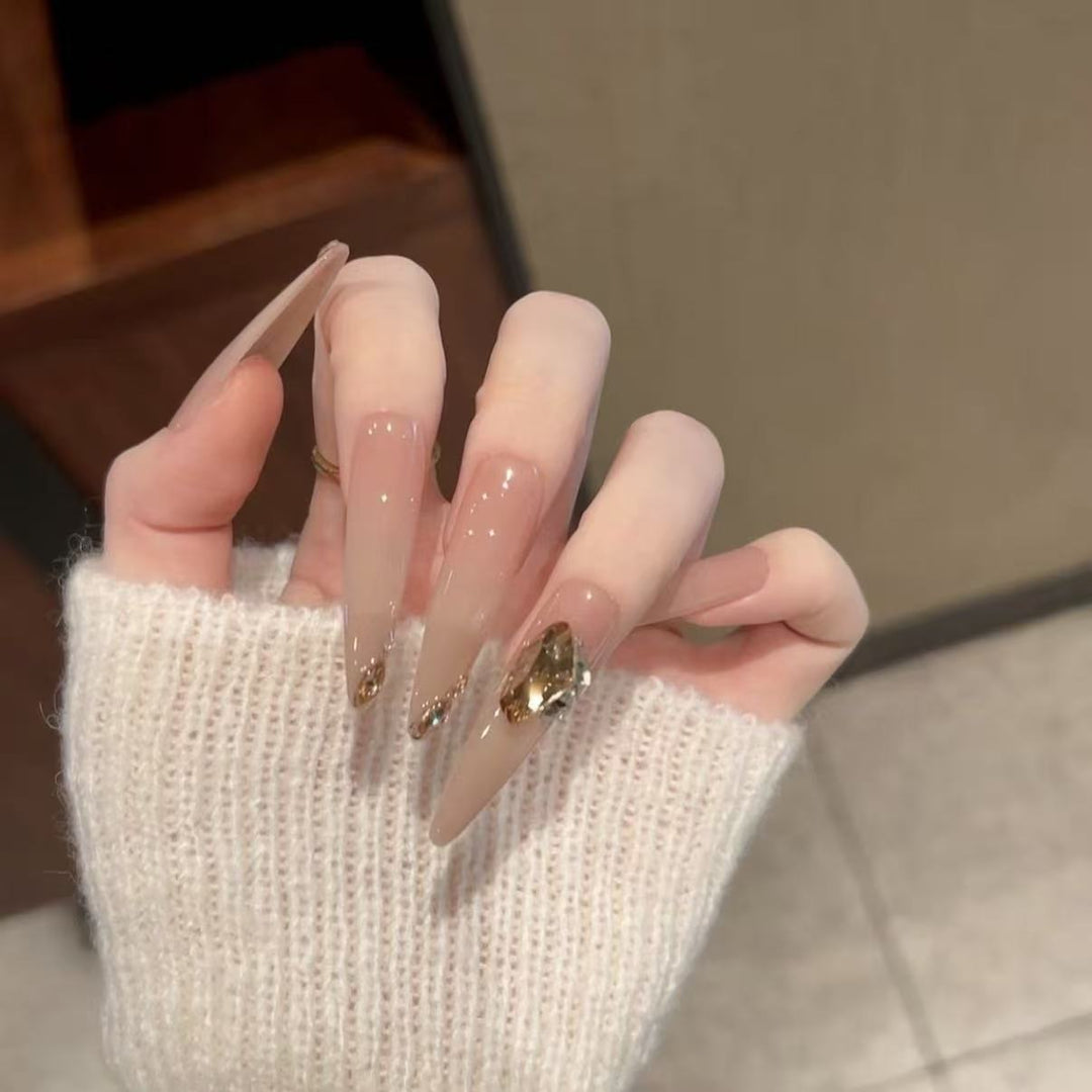 Artistic Stiletto Nail Art Extensions with Gemstone Accents