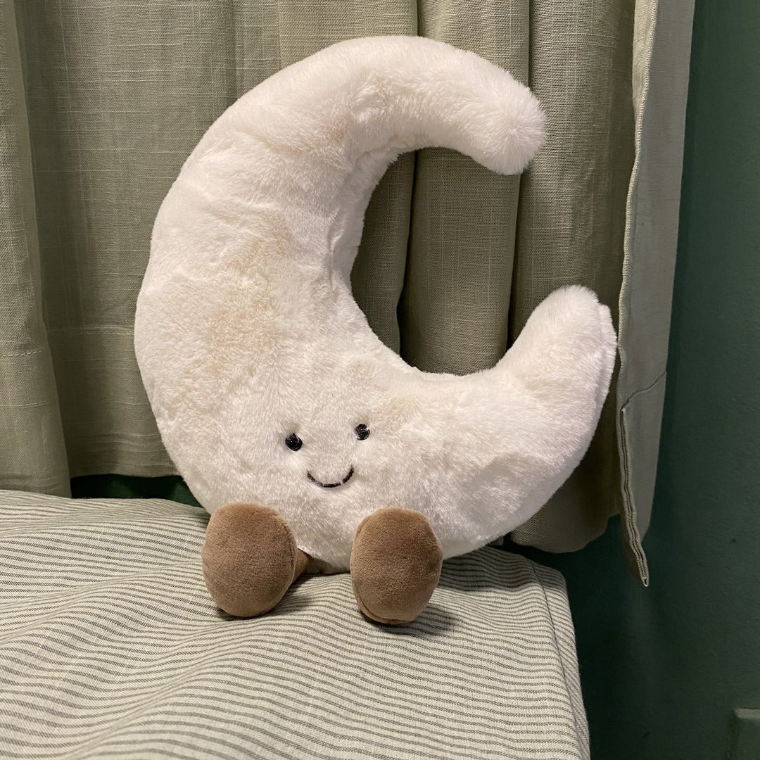 Plush cat cuddle pillow with large glitter eyes