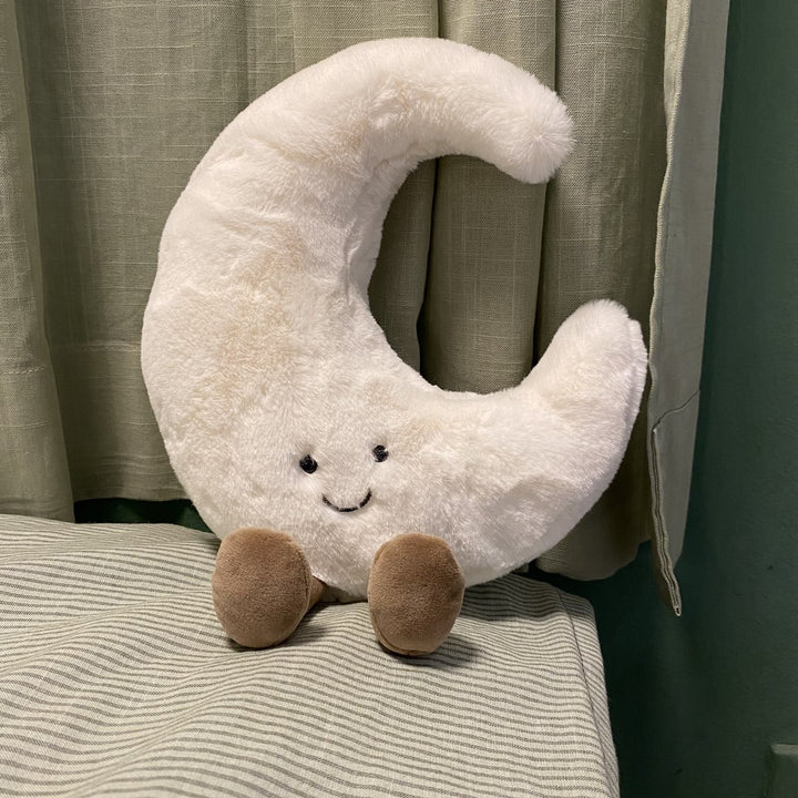 Plush cat cuddle pillow with large glitter eyes